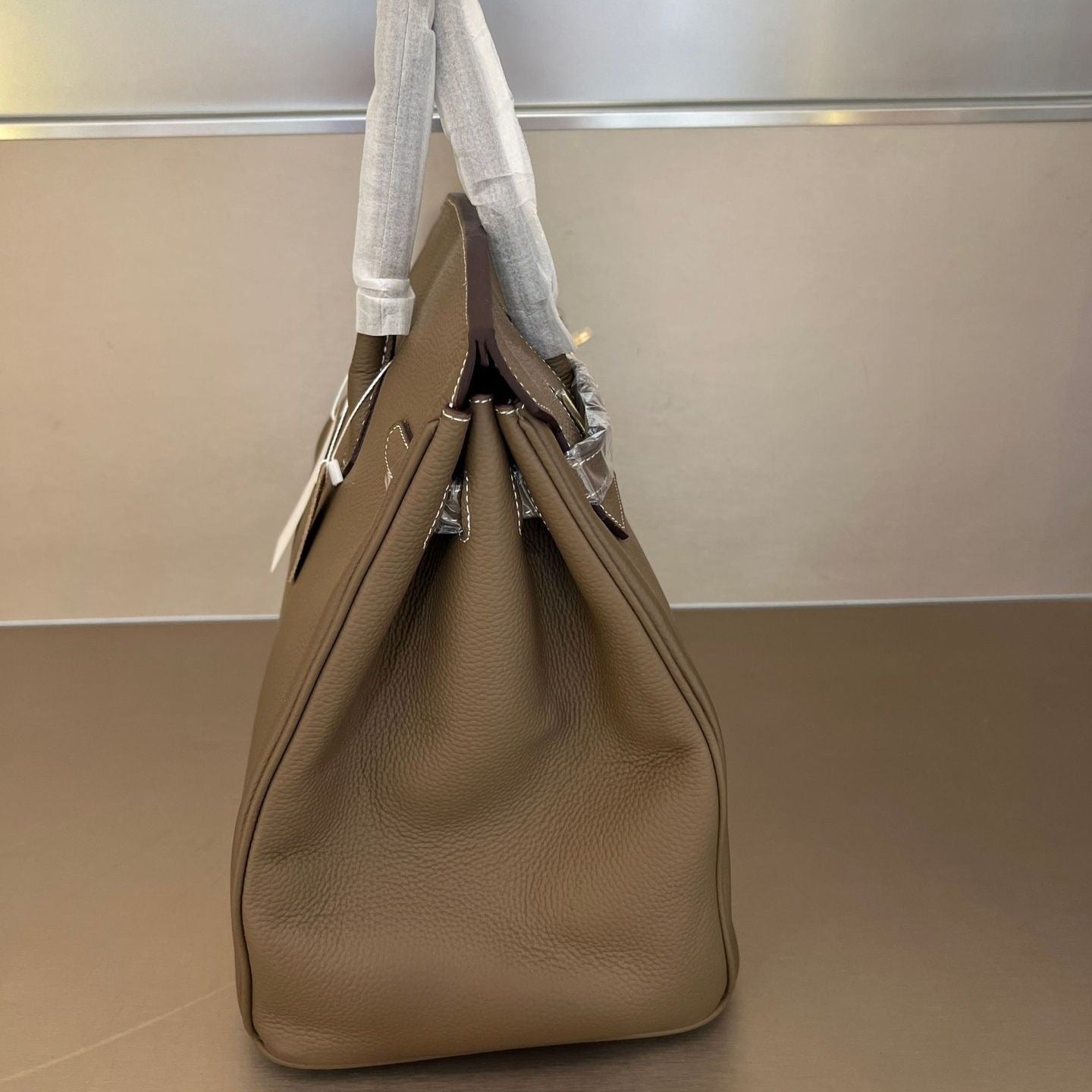 Her leather bag