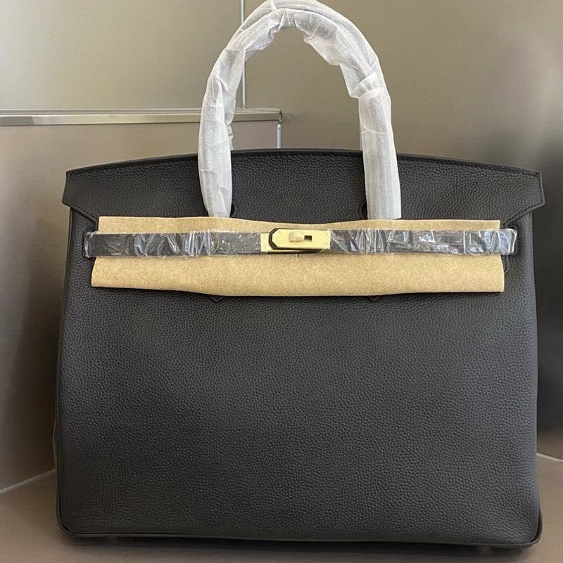 Her leather bag