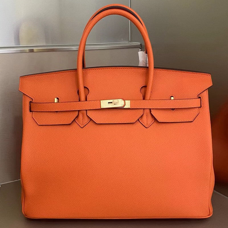 Her leather bag