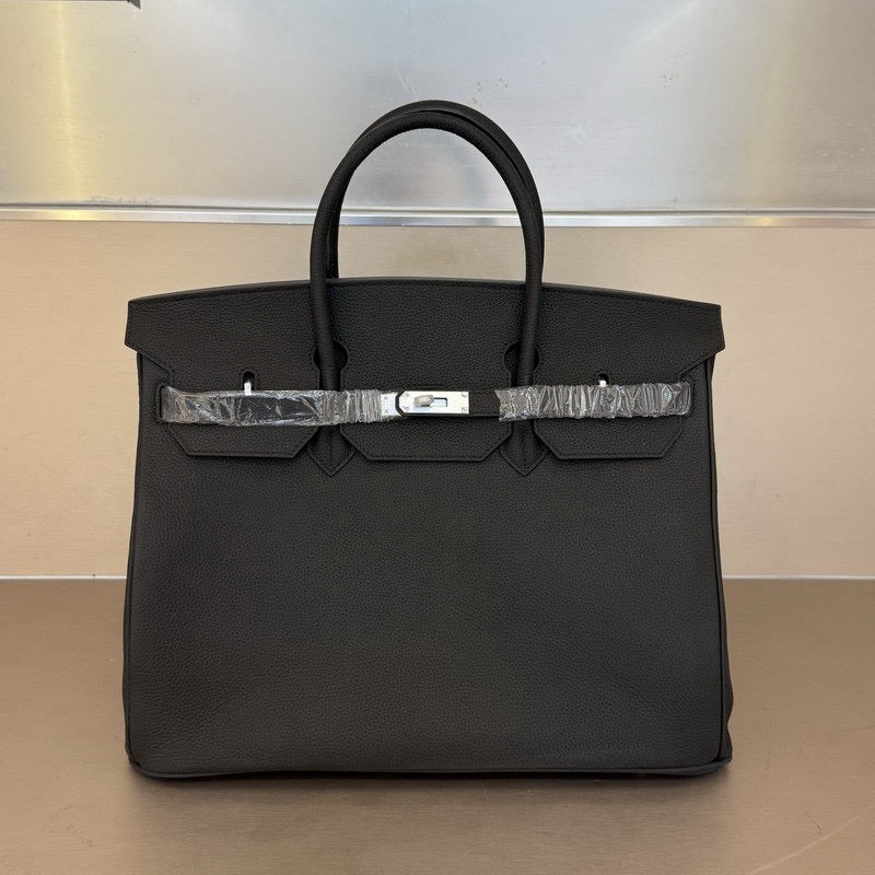 Her leather bag