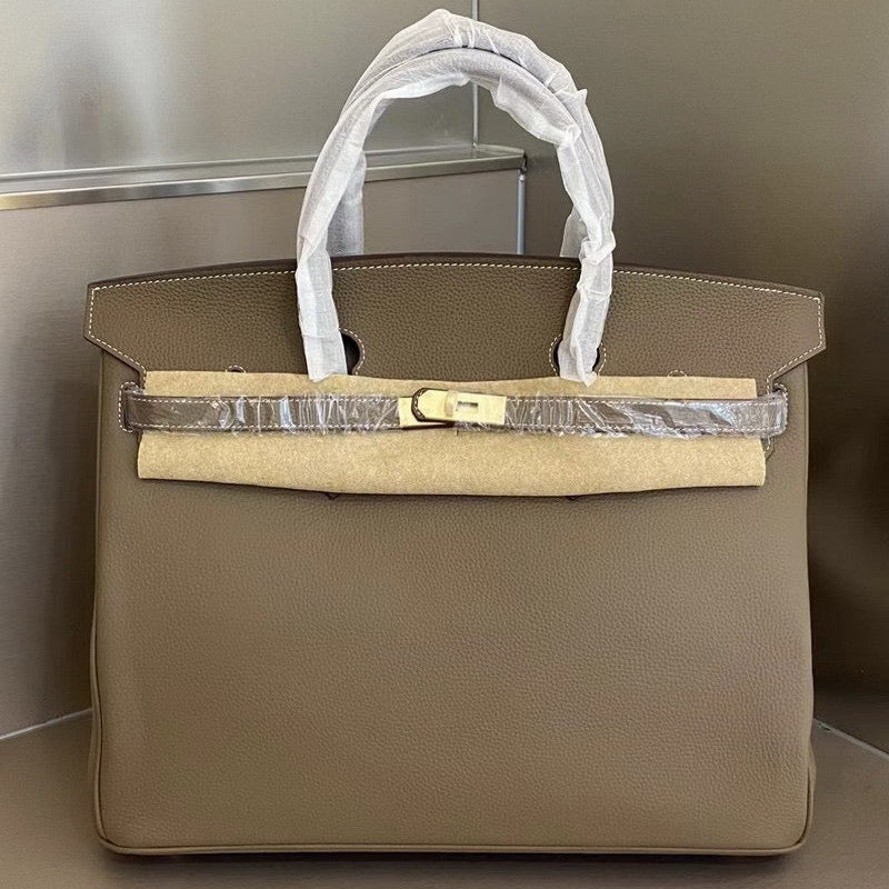 Her leather bag